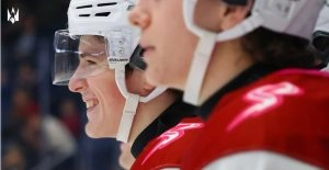 Joyful moment for Dauphin Kings player celebrating a hockey game, showcasing teamwork and determination in junior hockey.