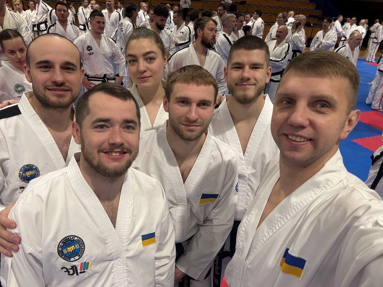 Ukrainian participants at the 189th International Instructor Courses in Trnava, Slovakia, celebrating Taekwon-Do excellence.