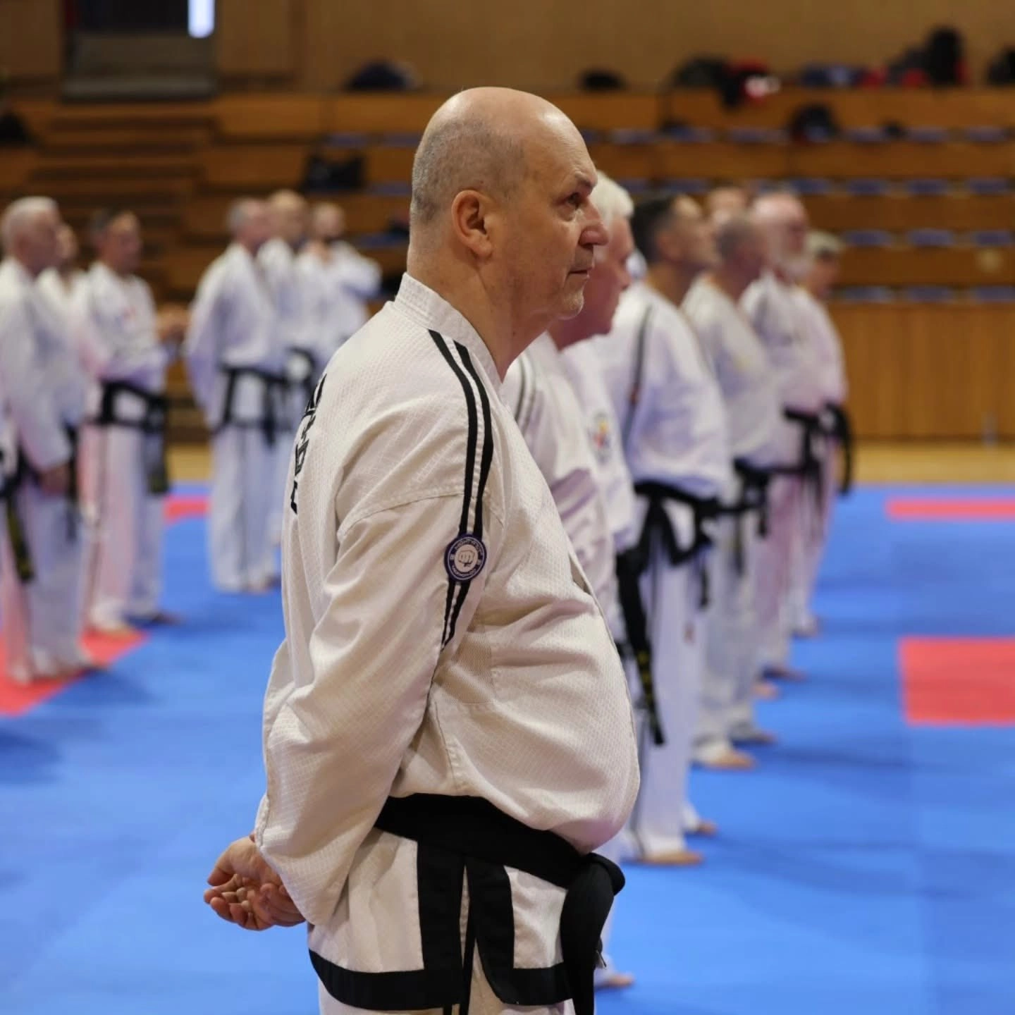 Taekwon-Do instructors at the 189th International Instructor Courses in Trnava, Slovakia, showcasing unity and expertise.
