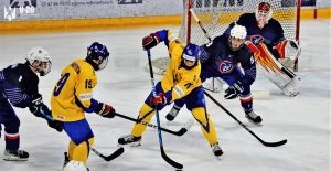 Youth hockey match: Ukraine vs France, key for World Championship squad selection, showcasing intense competition on ice.