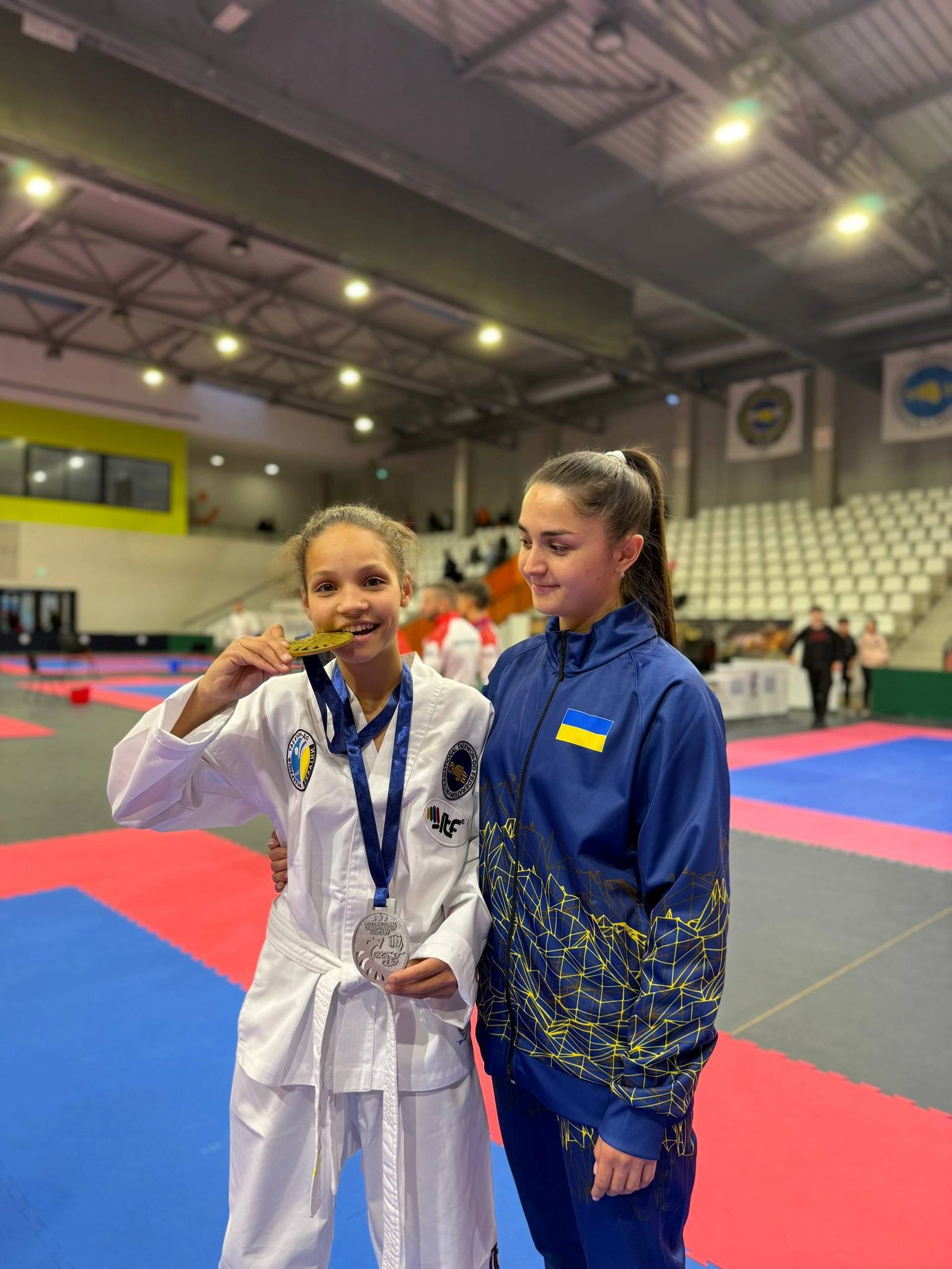 Ukrainian Taekwondo team at the XII MightyFist Open Eagles Cup, showcasing achievements with medals in Hungary