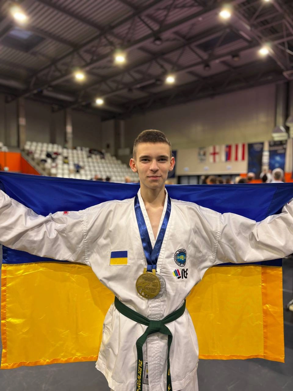 Ukrainian Taekwondo team celebrates success at XII Mightyfist Open Eagles Cup in Hungary, showcasing talent and teamwork.