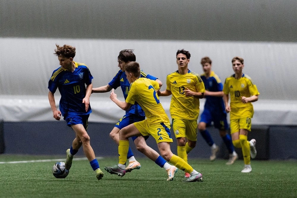 Young Ukrainian footballers compete in a training session, showcasing transparency and competence in UAF selection.