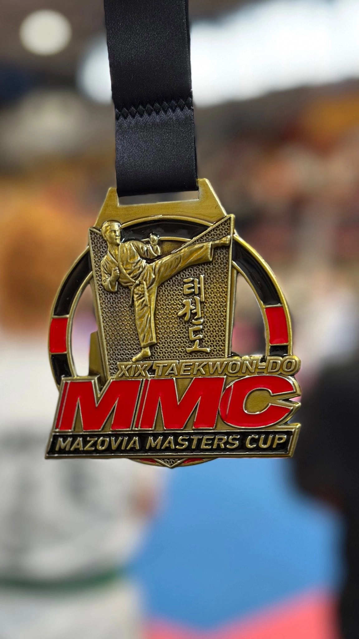 Gold medal from the Mazovia Masters Cup 2025, showcasing Ukrainian Taekwon-Do team