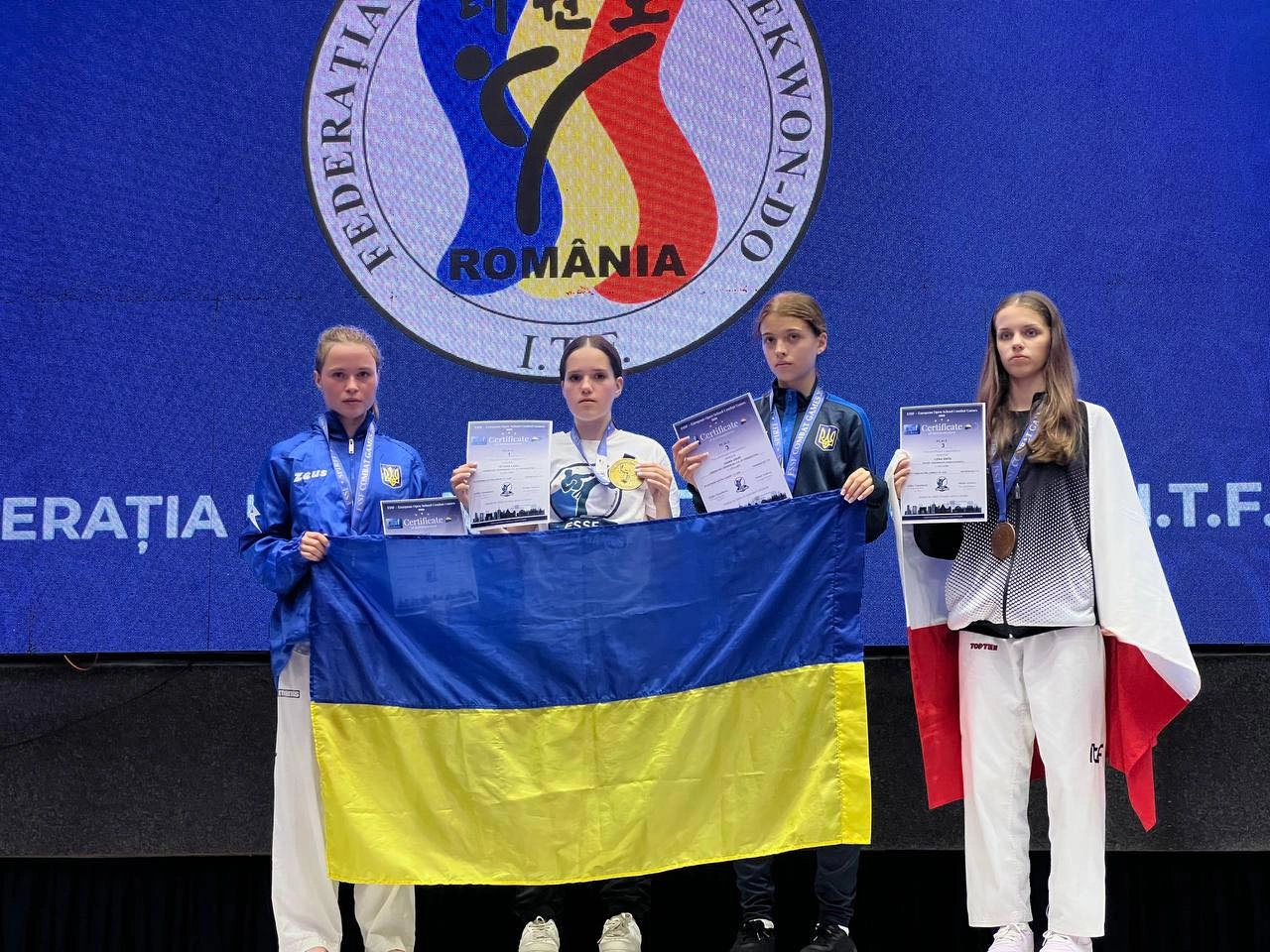 Ukrainian Taekwon-Do team celebrates success at ESSF Combat Games in Bucharest, showcasing talent and unity.