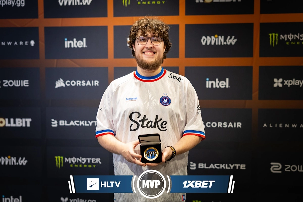 VitaliT player holding MVP medal after victory over FaZe at StarLadder Budapest Major, celebrating a historic win.