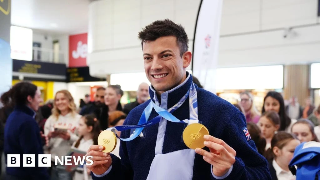 Олімпійський герой Мілан‑Кортіни 2026: як Вестона зустріли в Гатвику?