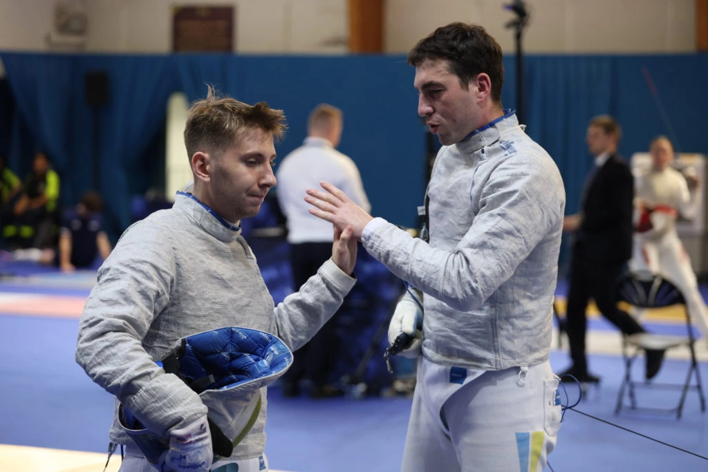 Андрій Ягодка та Олексій Стаценко обговорюють стратегію на чемпіонаті Європи у Франції